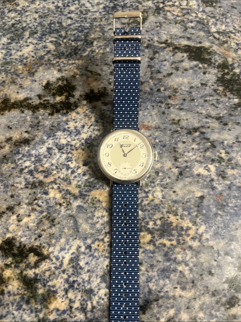 Tissot Silver Case Watch with Cream Dial and Navy Blue Nylon Strap